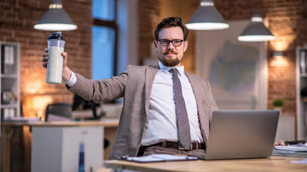 young_office_man_in_formal_clothes_sitting